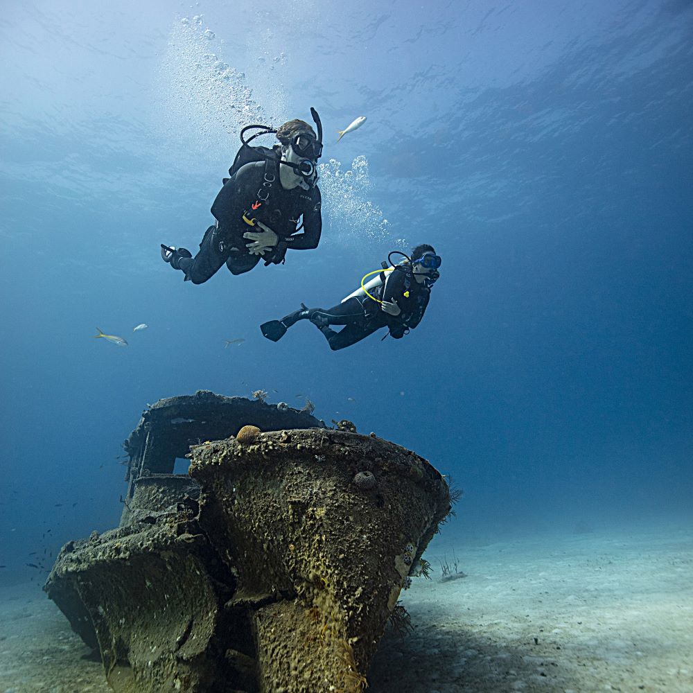 Small group of beginner divers in training